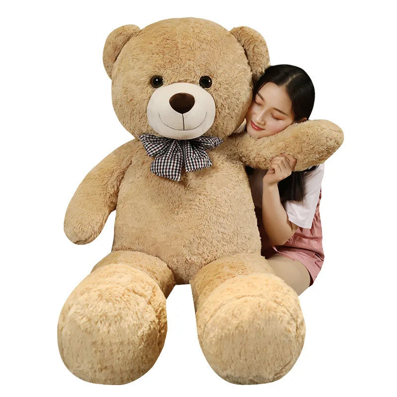 gaint teddy bear with ribbon