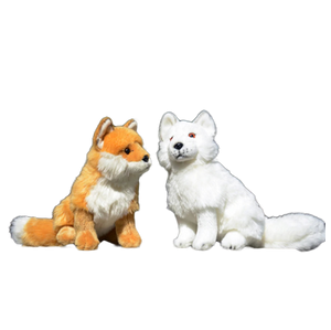 plush red fox and snow fox