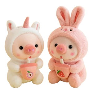 plush piglet holding bubble tea and wearing pyjamas