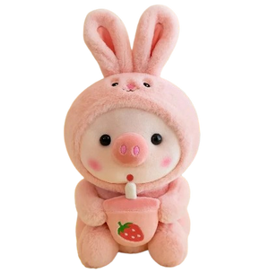 plush piglet holding bubble tea and wearing pyjamas